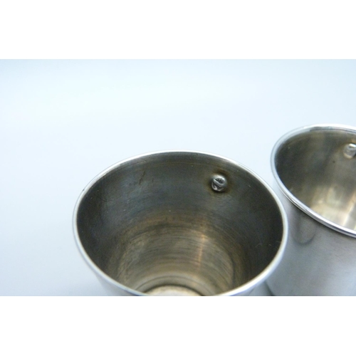 934 - A pair of continental silver vodka cups, 26g