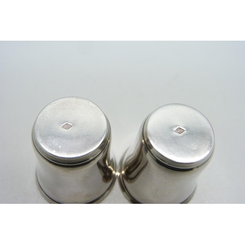 934 - A pair of continental silver vodka cups, 26g