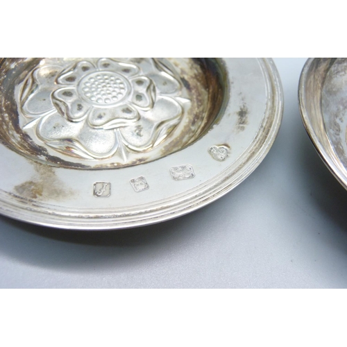 943 - A small plated dish with Mother Theresa coin inset and a silver Yorkshire Rose dish, 97g