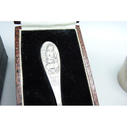 946 - A silver spoon and silver egg cup (not matching hallmarks), a silver nursery rhyme spoon 'Mary Had A... 