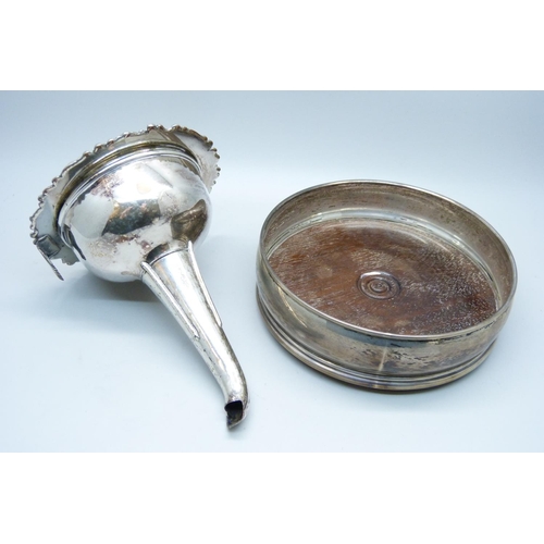 948 - A silver plated wine funnel and a silver wine coaster