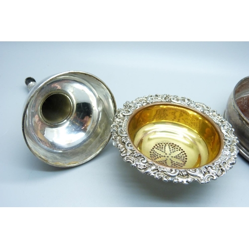 948 - A silver plated wine funnel and a silver wine coaster