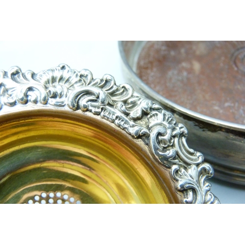 948 - A silver plated wine funnel and a silver wine coaster