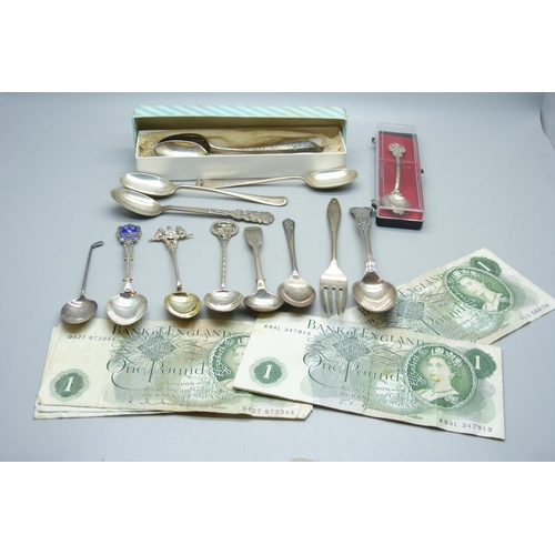 954 - Seven £1 banknotes, assorted silver teaspoons, coffee spoons and souvenir spoons, 275g