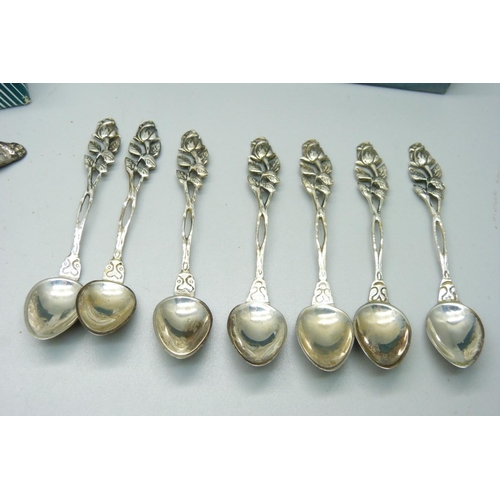 955 - A collection of 0.800 silver spoons, 75g