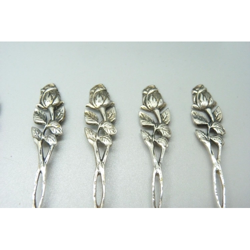 955 - A collection of 0.800 silver spoons, 75g