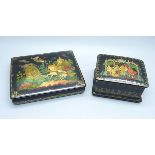 957 - Two Russian lacquered boxes with hand painted lids, both signed