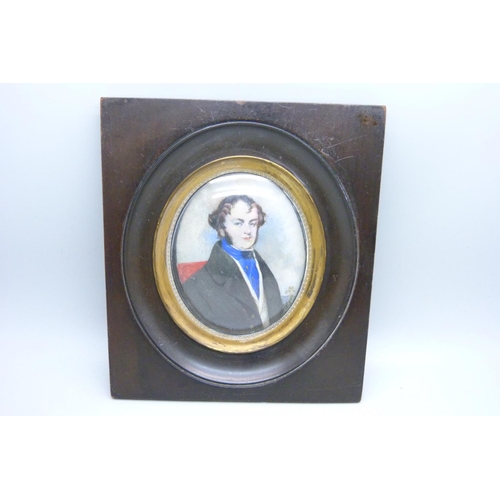 958 - An oval portrait miniature in an ebony frame