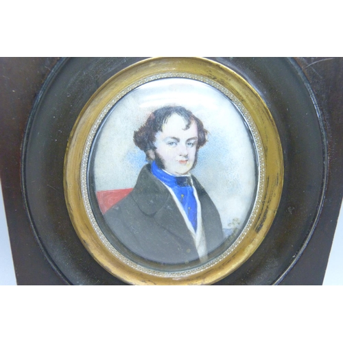 958 - An oval portrait miniature in an ebony frame