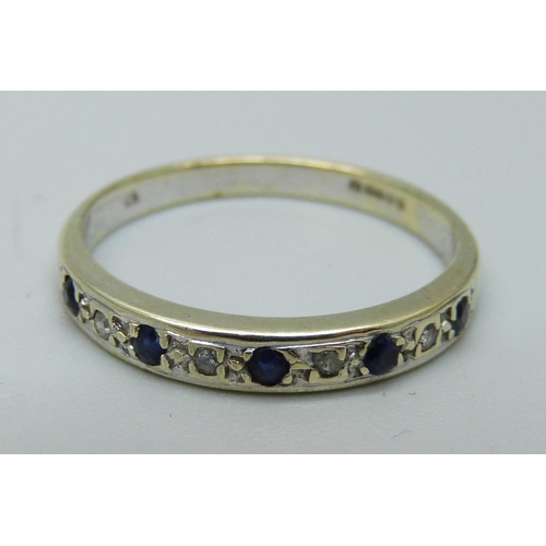 967 - A 9ct white gold sapphire and diamond ring, 2.3g, O