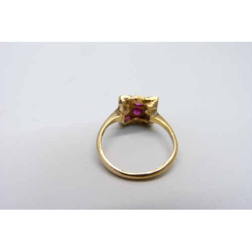 978 - A yellow metal, ruby and pearl ring, 3.2g, M, marked 21K