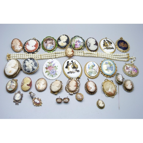 988 - A collection of cameo brooches, etc.