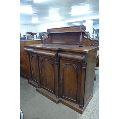 107 - A William IV rosewood breakfront three door sideboard