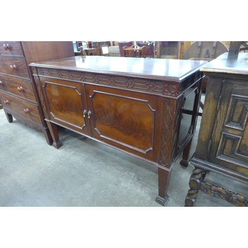 109 - An Edward VII Chippendale Revival mahogany two door washstand