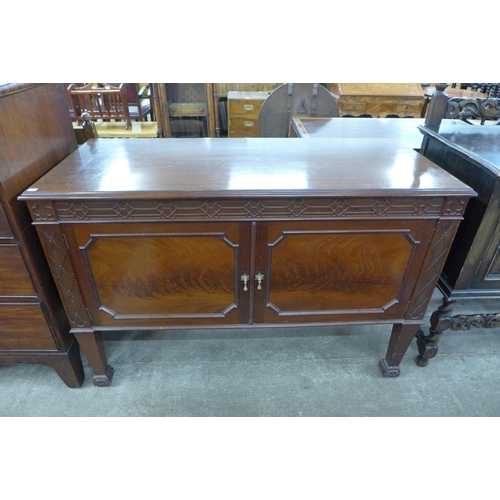 109 - An Edward VII Chippendale Revival mahogany two door washstand