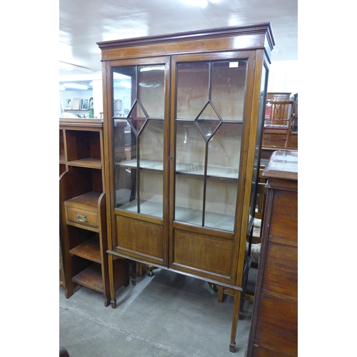 112 - An Edward VII inlaid mahogany two door display cabinet