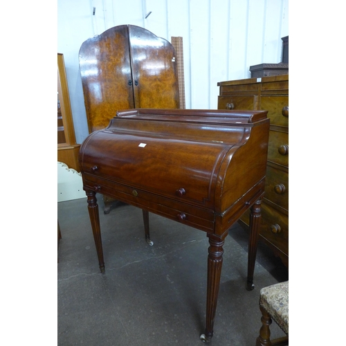 121 - A George IV style mahogany lady's cylinder desk, manner of Gillows