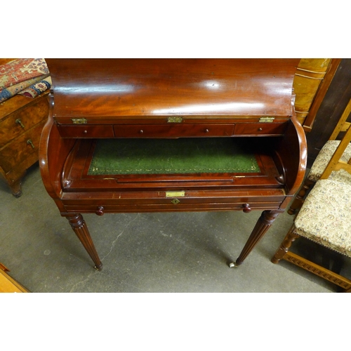 121 - A George IV style mahogany lady's cylinder desk, manner of Gillows