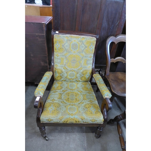 138 - A George IV mahogany and fabric upholstered open armchair