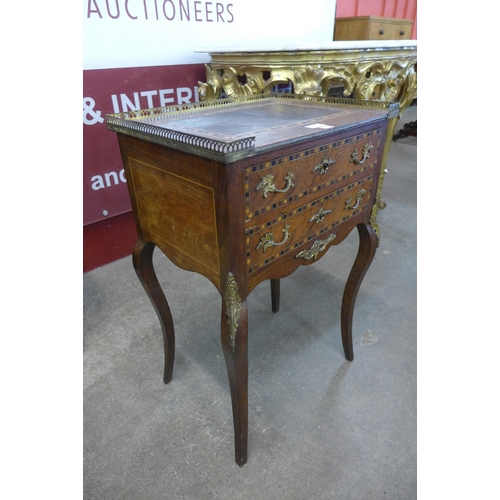 15 - A French Louis XV style inlaid rosewood and gilt metal mounted two drawer gueridon table