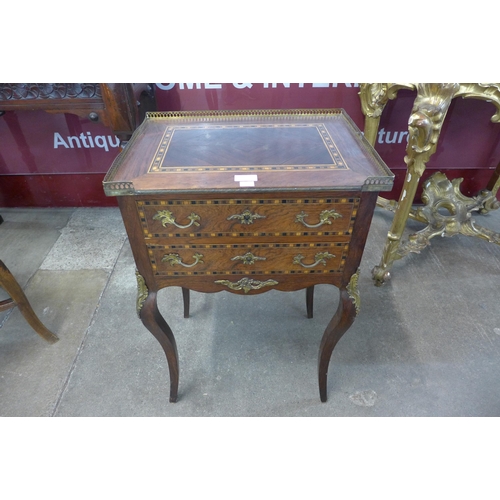 15 - A French Louis XV style inlaid rosewood and gilt metal mounted two drawer gueridon table