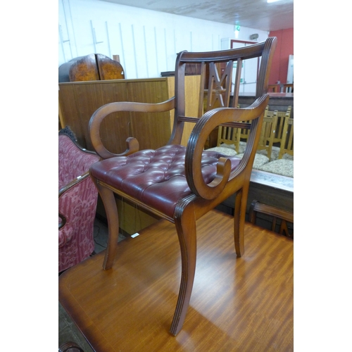 176 - A Regency style mahogany extending dining table and six chairs