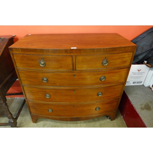 18 - A George III mahogany bow front chest of drawers