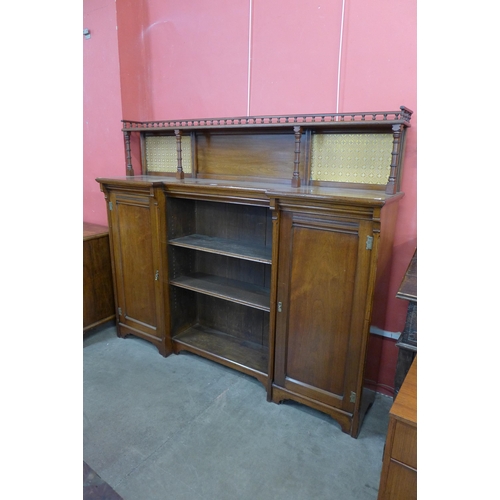 20 - A Victorian Aesthetic Movement walnut breakfront bookcase