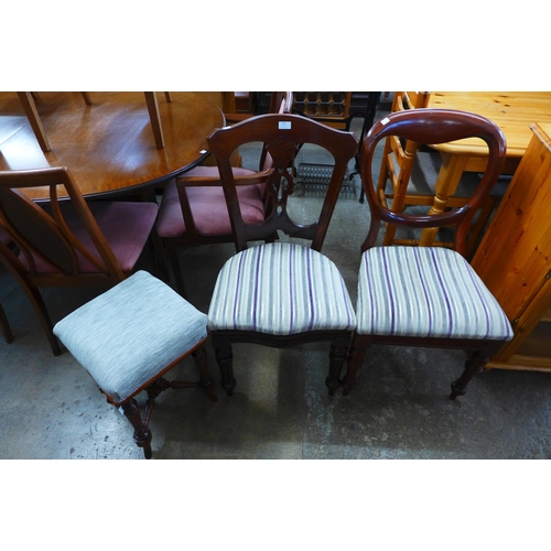 234 - Two Victorian mahogany chairs and a stool