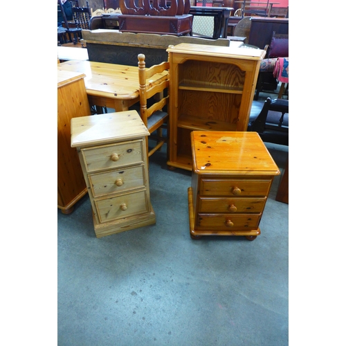 236 - Two small pine chest of drawers and a pine open bookcase