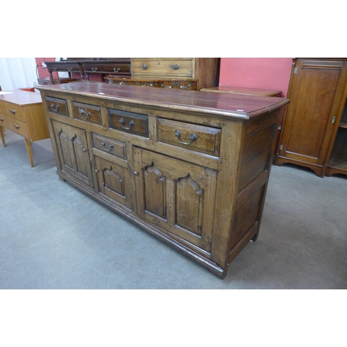 27 - A George II style oak dresser