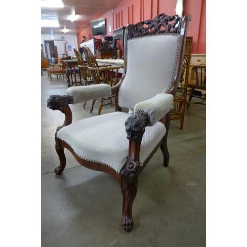 30 - A Regency style carved hardwood and fabric upholstered armchair