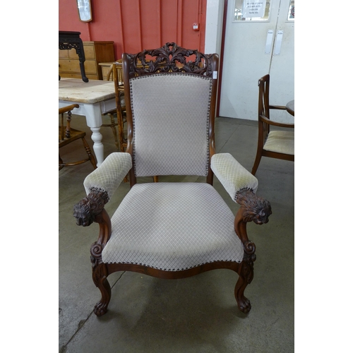 30 - A Regency style carved hardwood and fabric upholstered armchair