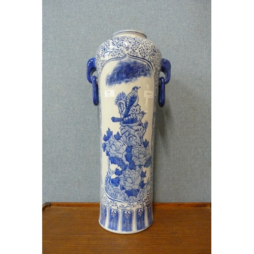 379 - An oriental blue and white porcelain two handled vase