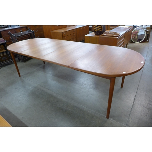 42 - A Swedish Hugo Troeds teak extending dining table, designed by Nils Jonsson