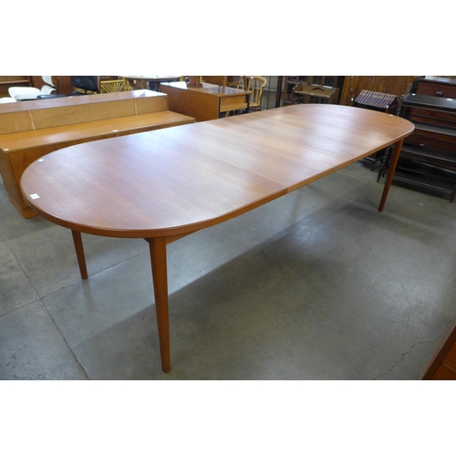 42 - A Swedish Hugo Troeds teak extending dining table, designed by Nils Jonsson