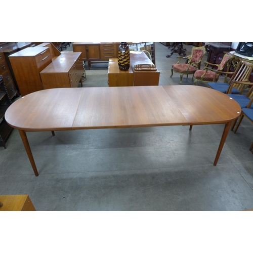 42 - A Swedish Hugo Troeds teak extending dining table, designed by Nils Jonsson