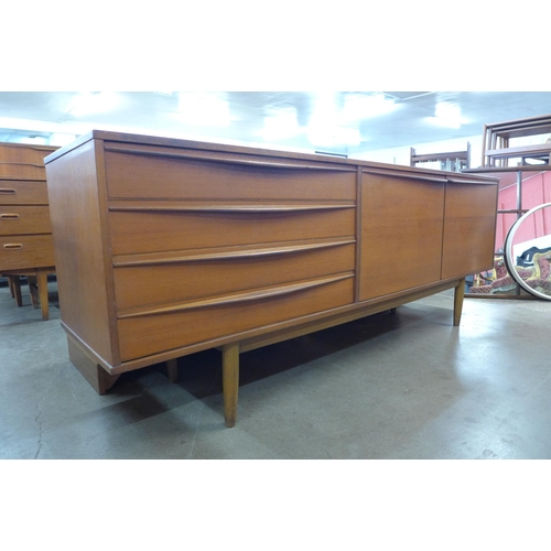 44 - A teak sideboard