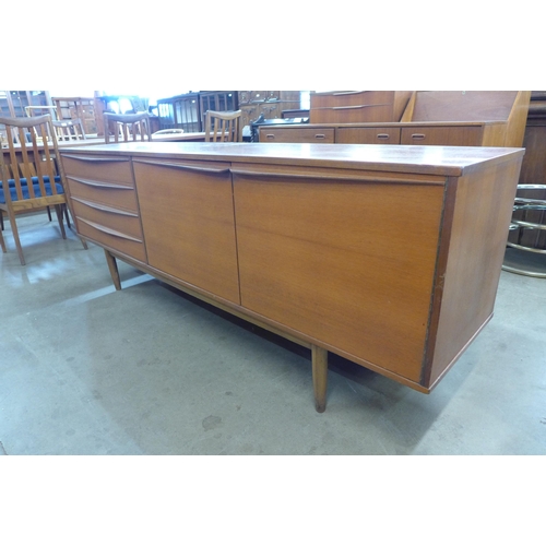 44 - A teak sideboard