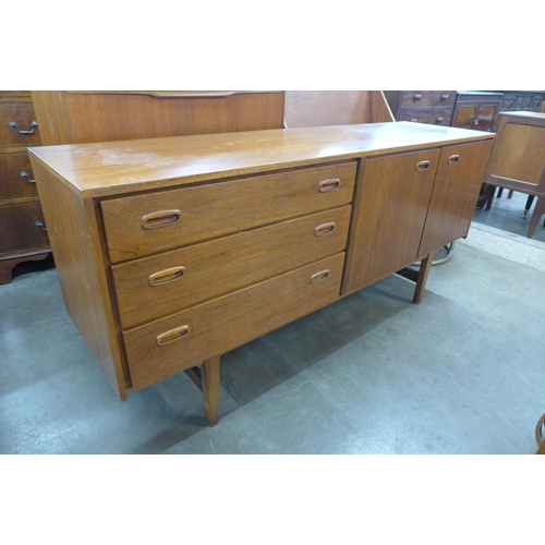 47 - A teak sideboard