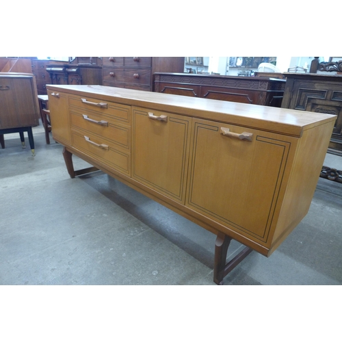 54 - A teak sideboard