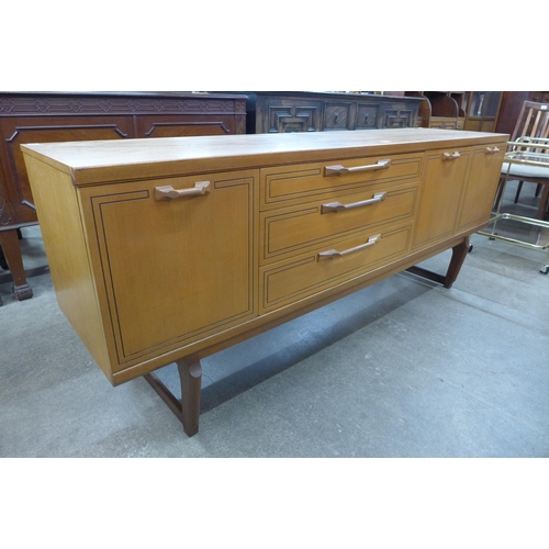 54 - A teak sideboard