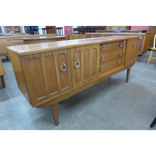 55 - A teak sideboard