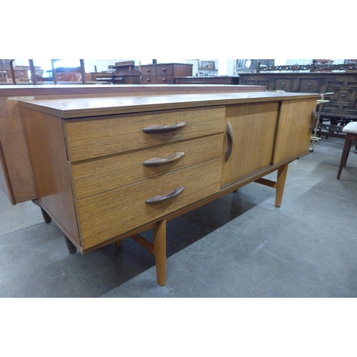 57 - An Avalon teak sideboard