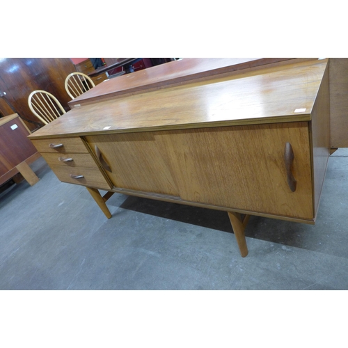 57 - An Avalon teak sideboard