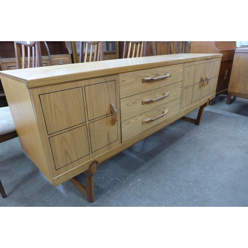 58 - A teak sideboard