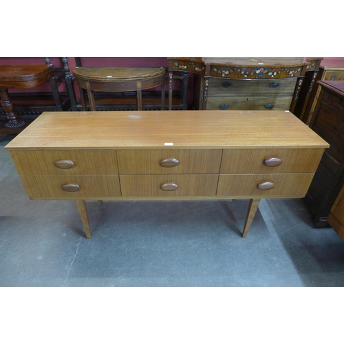 60 - A teak sideboard