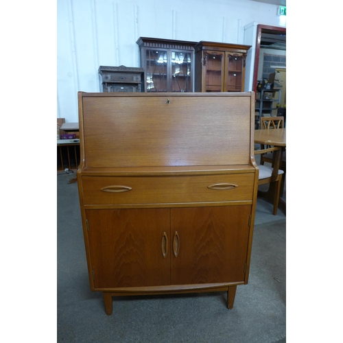 66 - A Jentique teak bureau