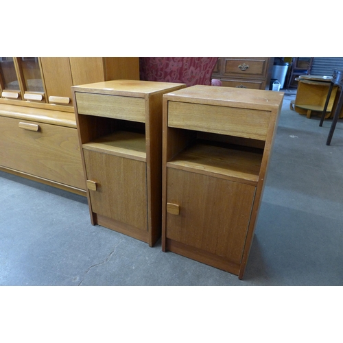 69A - A pair of Herbert Gibbs teak bedside cupboards