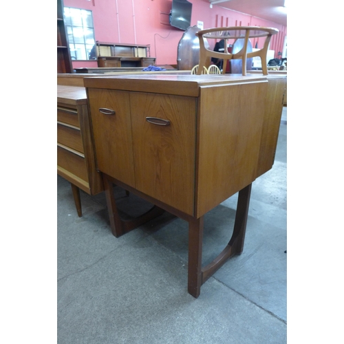 69C - A Remploy teak record cabinet